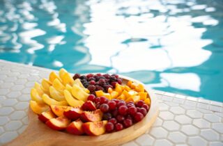 plate of fruit by the pool | Maitland Ave Smile Co.